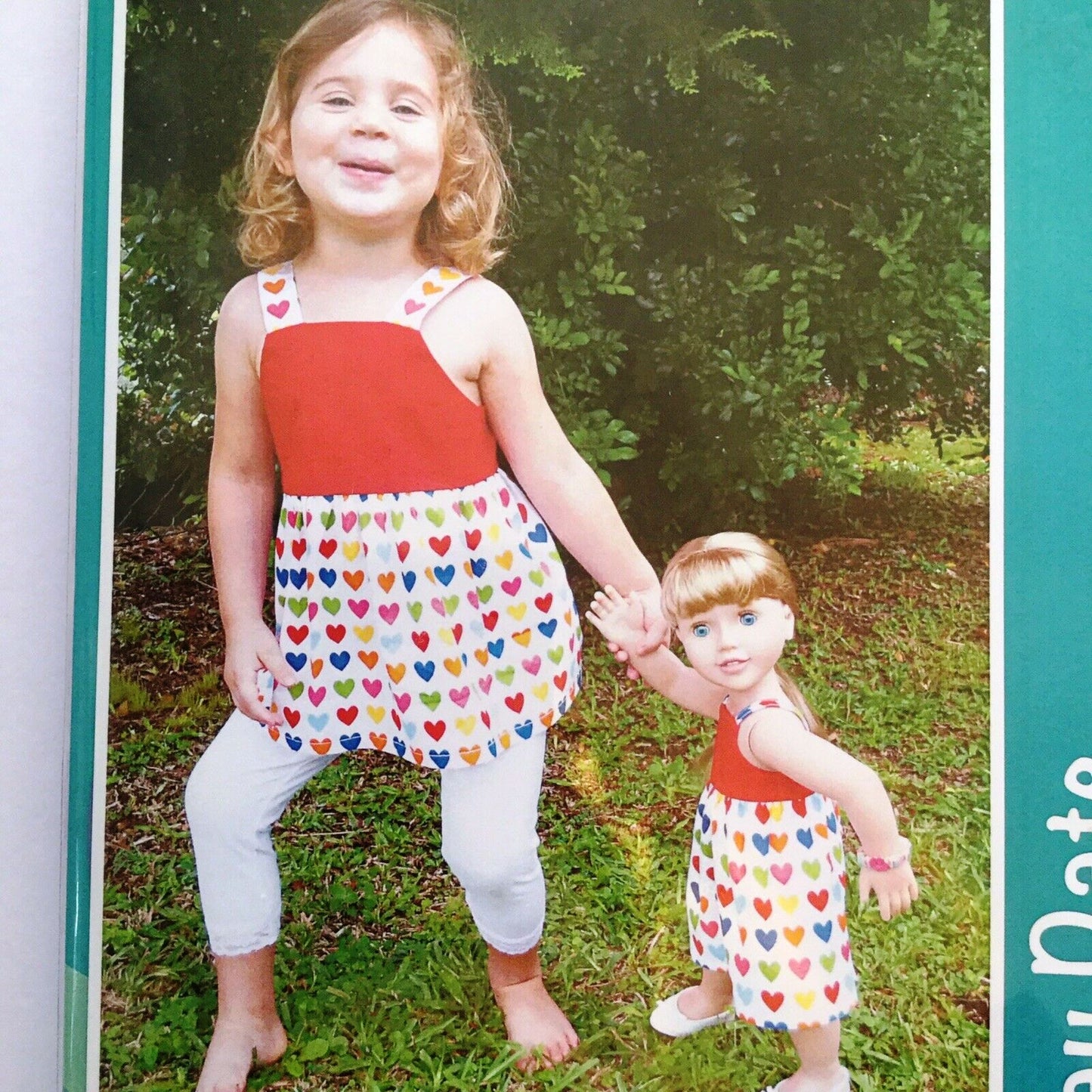 Child's top or dress sizes 2-8 and doll dress pattern with hanger
